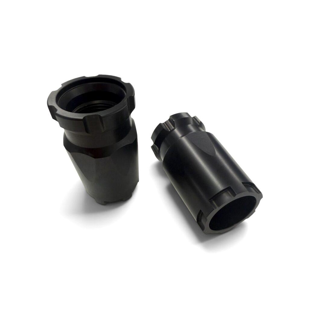 Two black plastic tubing adapters or couplers with ridged ends, shown against a white background (informative product image). - OTX Castle Blast Shields Are Back in Stock at Mid State Firearms , Mid State Firearms