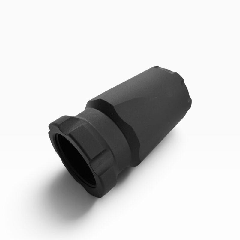 Close-up of a black metal cylindrical adapter with a knurled grip on a white background. - OTX Plan B Castle Blast Shield - Mid State Firearms , Mid State Firearms