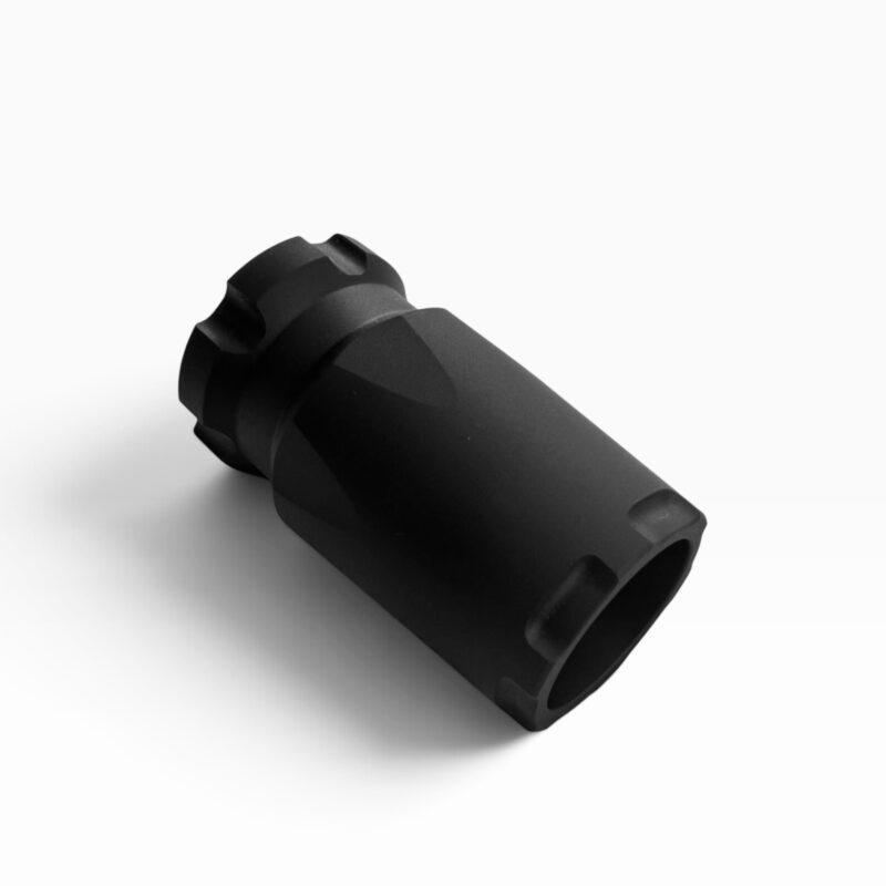 Black drill chuck adapter laid on a white background, photographed from an angled side view. - OTX Plan B Castle Blast Shield - Mid State Firearms , Mid State Firearms